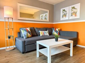 As you take a seat in the living room, the comfortable furniture and tasteful design make it easy to unwind.