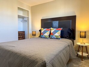 As you enter the bedroom, the comfortable bedding and peaceful atmosphere create the perfect retreat from the day.