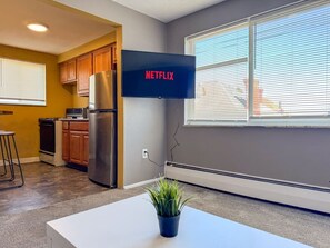 Once you enter the living room you'll find a space that feels both luxurious and cozy, perfect for unwinding after a long day.