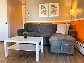 As you take a seat in the living room, the comfortable furniture and tasteful design make it easy to unwind.