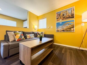 Once you enter the living room you'll find a space that feels both luxurious and cozy, perfect for unwinding after a long day.