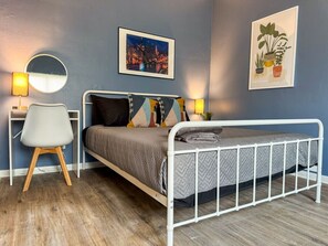 As you enter the bedroom, the sophisticated decor and plush bedding create a space where you can truly unwind.