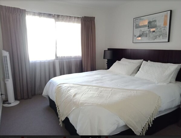Enjoy a restful night’s sleep on our king-sized bed with soft, professionally cleaned linens, offering a fresh and inviting space to unwind.