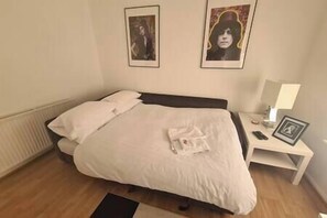 Sofa in lounge quickly changes to a double bed if required 