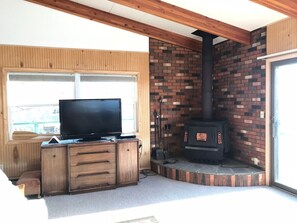 Fully functioning wood stove. Heats the entire property very well but there is also a mini split system that provides heat. Unlimited wood is provided for stove and it lends a lovely ambiance for cooler nights.