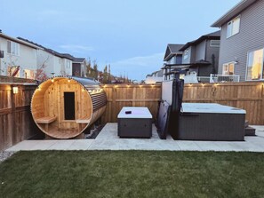 Mini Nordic Spa with Hot Tub, Sauna and Cold Plunge. Please note that these amenities are shared with the upstairs guests (if present.)