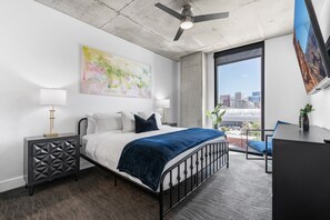 King Bedroom luxuriously designed. 55" TV. Extremely comfortable with an attached bathroom and walk in closet.