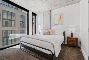 King Bedroom luxuriously designed. 55" TV. Extremely comfortable with an attached bathroom and walk in closet.