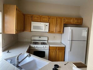 Kitchen including dishes, washing machine for dishes brand new