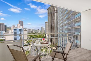 Enjoy coffee while having a city view from your balcony.