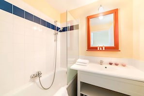 Get ready for the day in the modern and bright bathroom.