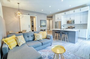 Furnished Living Room with Modern Interior Design - Corporate Apartments - 1-Bedroom