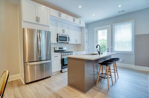 Modern Kitchen with Whirlpool Stainless Steel Appliances - Corporate Housing Atlanta - 1-Bedroom