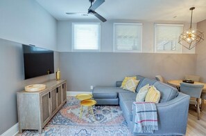 Furnished Living Room with Modern Interior Design - Corporate Apartments - 1-Bedroom