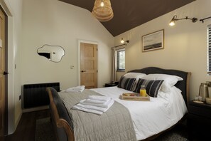 Bedroom with a king-size bed and en-suite shower room