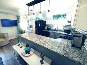 Open kitchen with granite countertops