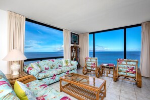 The only thing more soothing than this couch is the view behind it?panoramic ocean poetry framed in glass     MAH-1219