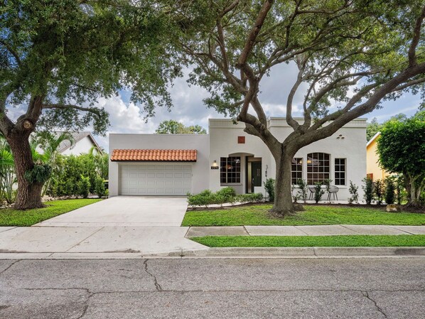 Large driveway with parking for up to two cars.