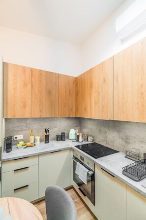 Kitchen Area with a Dishwasher - Book Now with RENTUJEMY.COM