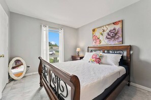A queen bed is provided in the Front Bedroom