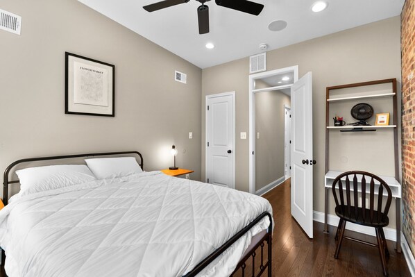 Second bedroom upstairs, comes with its own hallway bath, desk, & closet.