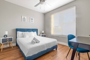 The bedroom offers a sanctuary of calm, where you can unwind and recharge in comfort and style.