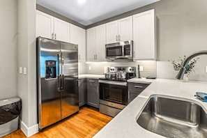 As you step into the kitchen, the clean lines and functional design make you eager to start cooking your favorite dishes.