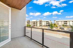 The house’s exterior is a blend of modern and classic design elements, creating a welcoming and stylish facade.