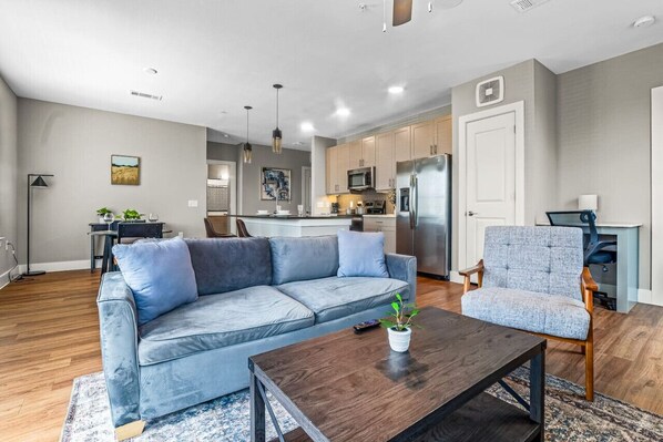 Spacious living room with stylish decor, perfect for unwinding after a day of exploring the local area.