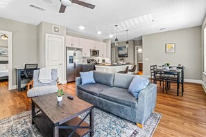 Once you enter the living room you'll find a space that feels both luxurious and cozy, perfect for unwinding after a long day.