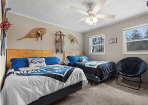 This room has been updated. Full over full bunk bed with full bed. 3 beds total.