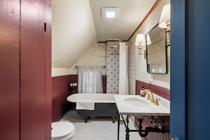 This is the 3rd full bathroom. There is an antique claw foot tub and shower head