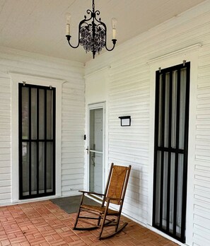 Enjoy a rock on the peaceful front porch.