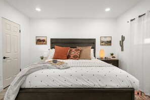 Bedroom 1— King-size bed and Smart TV