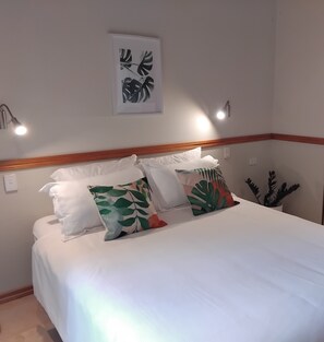 Second bedroom, with comfortable queen bed, plenty of wardrobe space
