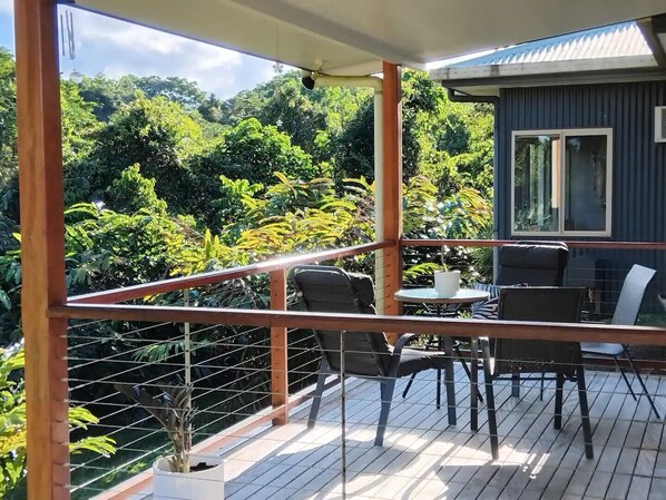 Enjoy the views and tropical sounds of local wildlife from your private balcony