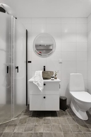 Bathroom with shower towel warmer