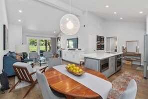Open concept kitchen, dining room, living room