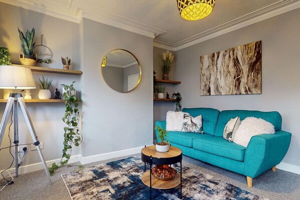 Embrace the essence of modern living in this stylish living room. Featuring a comfortable couch, a sophisticated coffee table, and a state-of-the-art television, it is the perfect setting for unwinding after a long day. 🏡📺 #InteriorInspiration #Relaxation