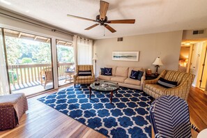 Living area with corner views of the fairway on course #5
