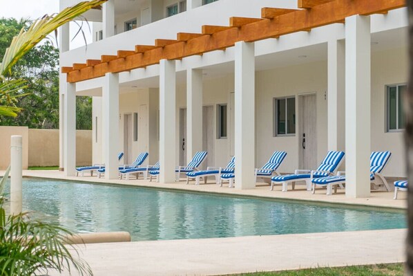 Dive into luxury: Experience bliss in our inviting pool area