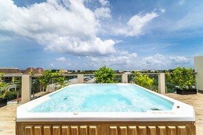 Relax and unwind in your private jacuzzi after a day of exploring