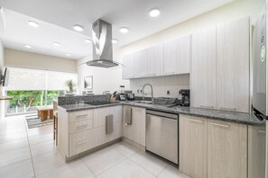 Fully equipped kitchen with modern appliances, perfect for cooking up your favorite meals