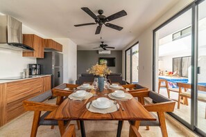 Gather around the elegant dining table for memorable meals and conversations