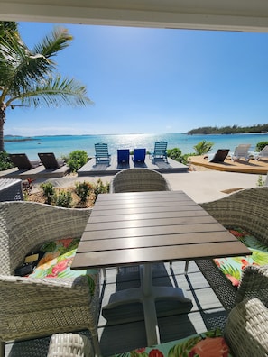 View of our oceanfront Sundeck & Elizabeth Harbour from our front porch deck.