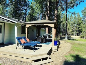 Back deck, lounge chairs, dining and BBQ