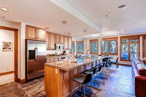 Upscale kitchen with breakfast bar