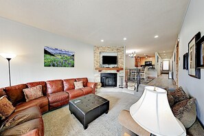 Comfortable space for gathering with fireplace and sectional sofa