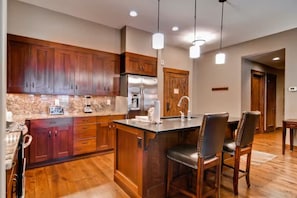 Kitchen island has seating for two