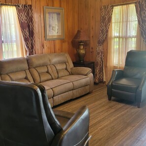 Living room with 2 recliners and couch